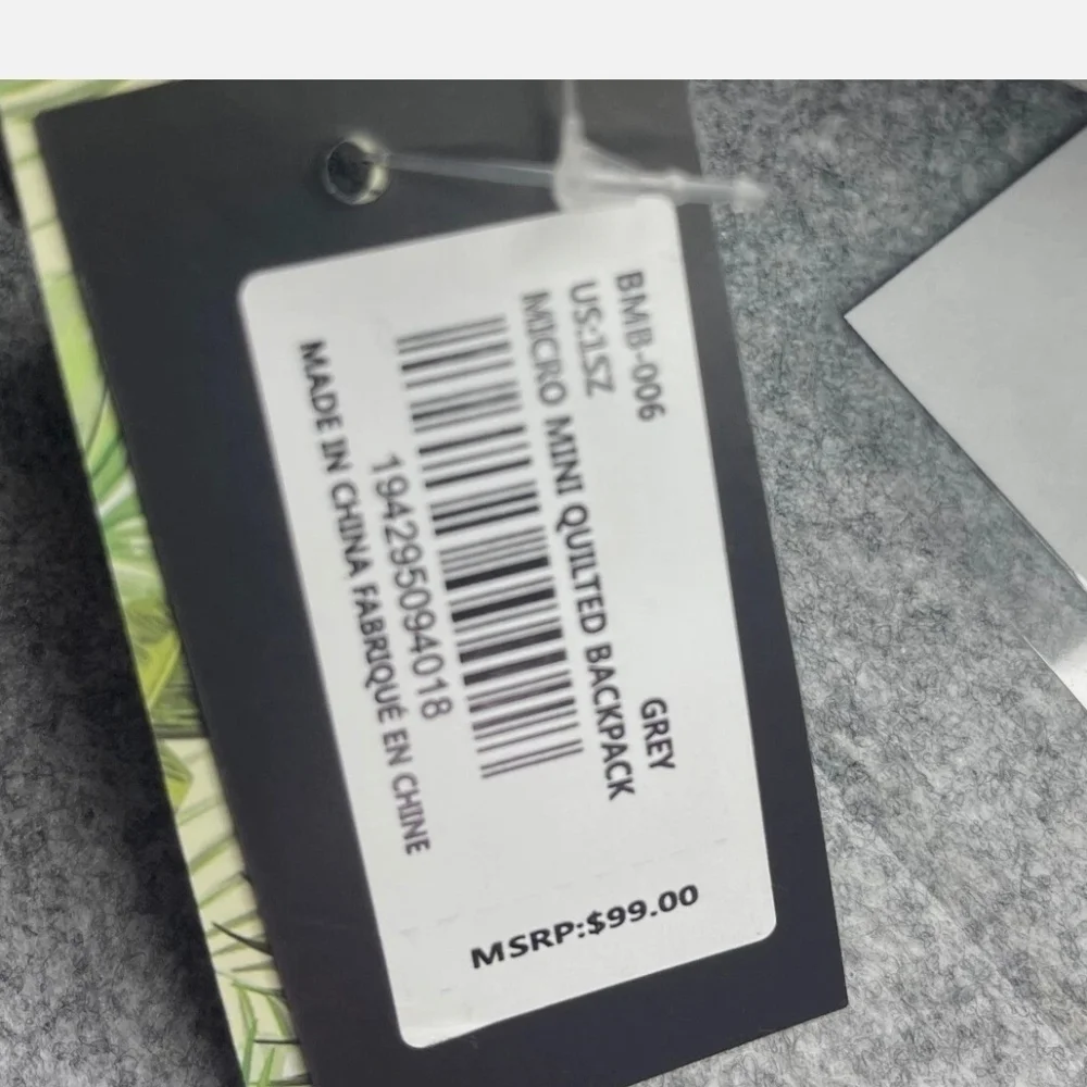 Badgely Mischka quilted mini  backpack, gray with gold tone hardware NWT